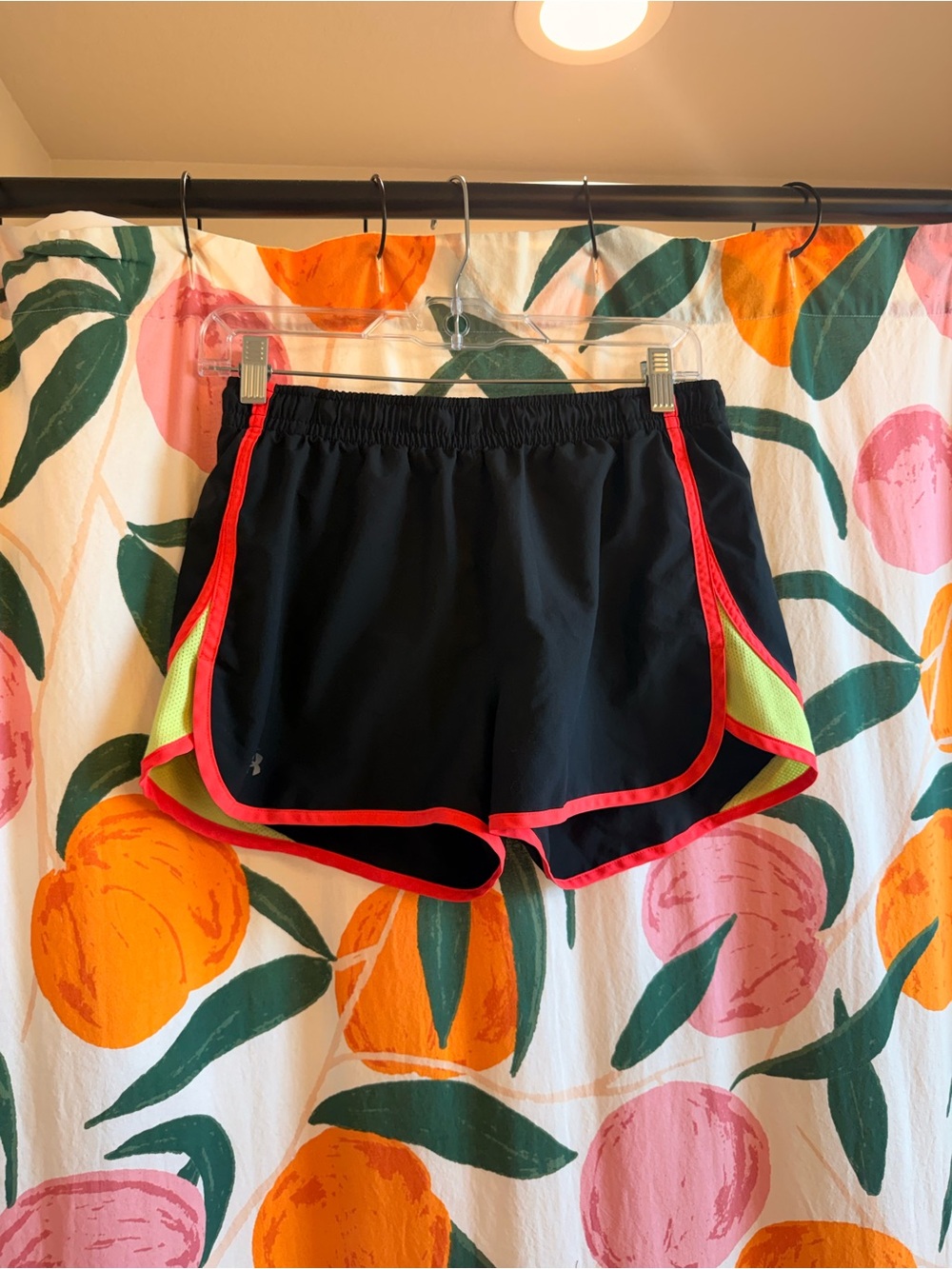 Under Armour Black Athletic Shorts with Neon Yellow Panels and Pink Trim